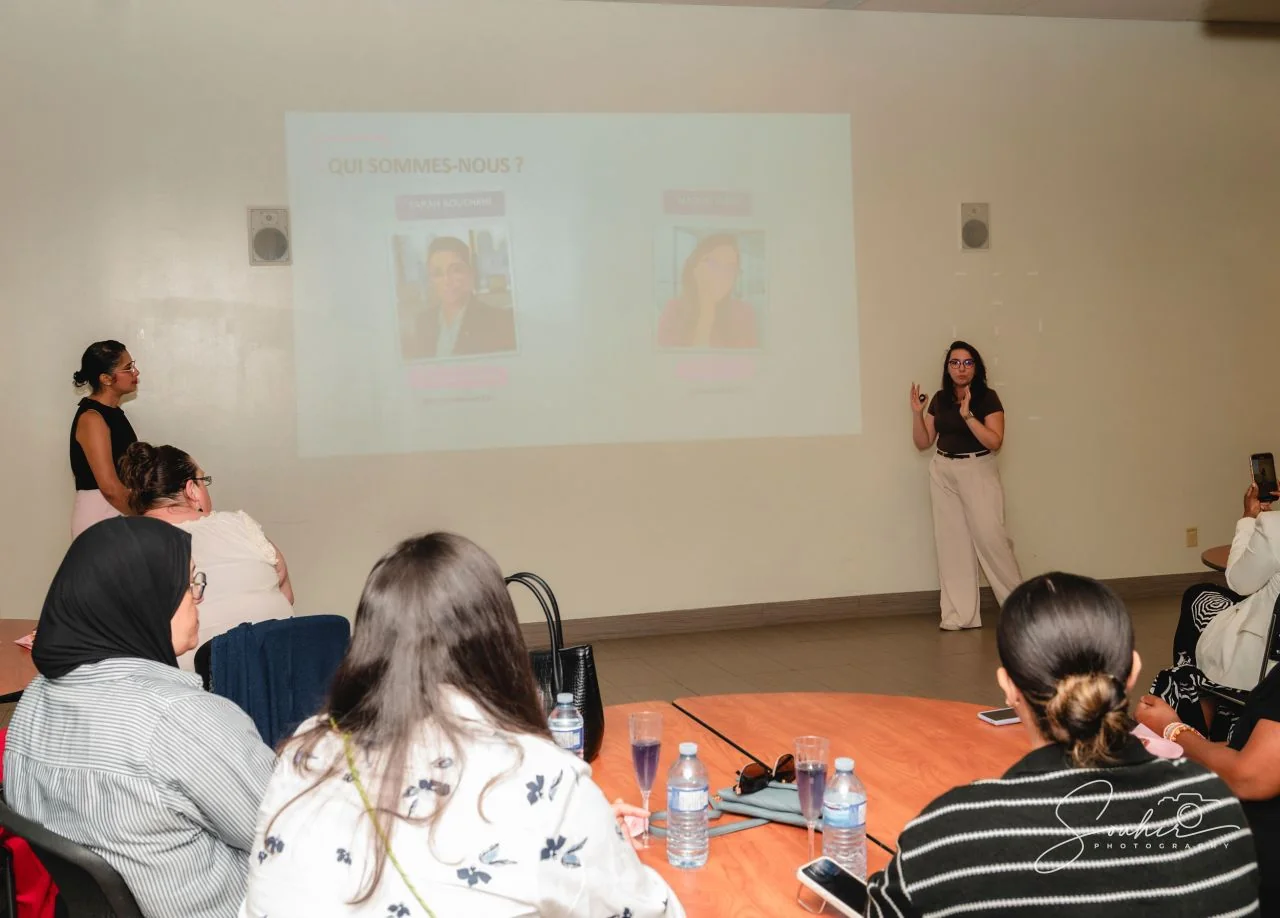 A previous AI training session with Nadeje presenting to the room